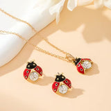 Korvakorut Leppäkertut – Onnen talisman – ilmainen kaulakoru | Rajoitettu tarjous