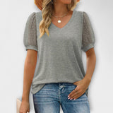 Rema - V-halsinen toppi läpinäkyvillä hihoilla