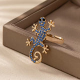 Gecko-korvakorut onnenamuletin kanssa – ilmainen sormus | Rajoitettu tarjous