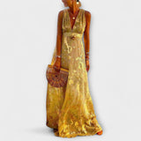 V-aukkoinen mekko paljeteilla