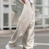 Vapaamman istuvuuden linenhousut miehille