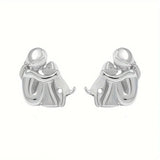 Hug korvakorut hopea ja kultaa