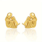 Hug korvakorut hopea ja kultaa