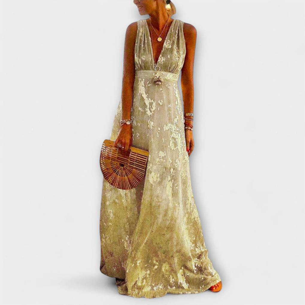 V-aukkoinen mekko paljeteilla