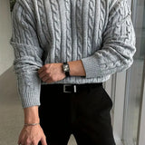 Mergim – Rento neulepusero pitkillä hihoilla