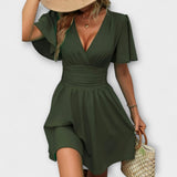 Winslet - V-kaula-aukko ja rypytetty vyötärömekko