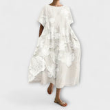 Olivia - Tyylikäs kukkakuvioinen mekko