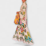 Lisa - Tyylikäs maksipaita, kukkakuviolla ja kevyellä, soljuvalla leikkauksella