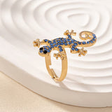 Gecko-korvakorut onnenamuletin kanssa – ilmainen sormus | Rajoitettu tarjous