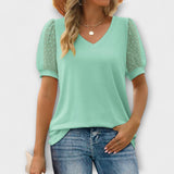 Rema - V-halsinen toppi läpinäkyvillä hihoilla