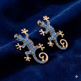 Gecko-korvakorut onnenamuletin kanssa – ilmainen sormus | Rajoitettu tarjous