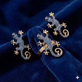 Gecko-korvakorut onnenamuletin kanssa – ilmainen sormus | Rajoitettu tarjous