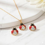 Korvakorut Leppäkertut – Onnen talisman – ilmainen kaulakoru | Rajoitettu tarjous